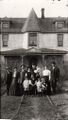 0000-rml-0221b-unknown-family-five-kids-house-with-spire.jpg