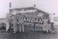 1962-beautification-208b-raising-welcome-sign.JPG