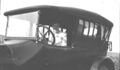 1918-auto-0002-woman-in-dark-car-1600.jpg