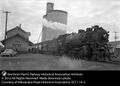 1952-1954-unk-0017-steam-locomotive-station-north-concrete-elevators.jpg