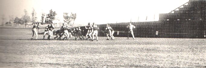 1955-rhs-yearbook-33a-football-game-bleachers-cemetery-water-tower.jpg