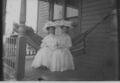 1915-1930-fb-0070-mary-belle-and-maybe-bertha-on-porch-mclain-farmhouse.jpg