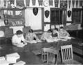 1966-03-dan45-000335-ffa-five-students-helping-1600.jpg