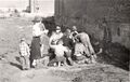 1959-beautification-019a-boy-scouts-coaxing-marshmells-beside-langs-garage.JPG